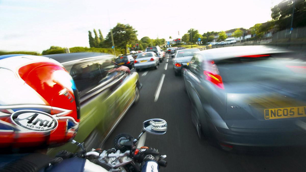 Riding a Motorcycle among cars in UK